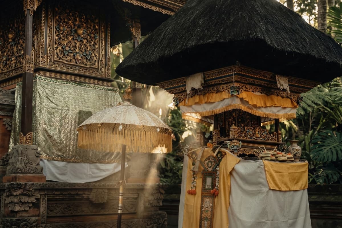 Balinese temple adorned with ceremonial umbrellas and offerings, celebrating Nyepi 2026, the Day of Silence in Bali